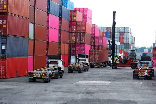 Container truck in port for shipping container logistics business, concept export, import logistic