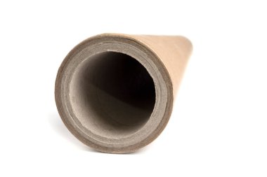 Empty paper tube from a material on a white