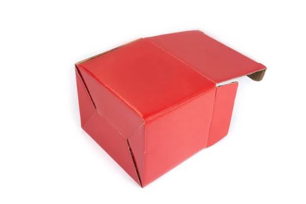 黑色背景上的空红纸盒 — 图库照片