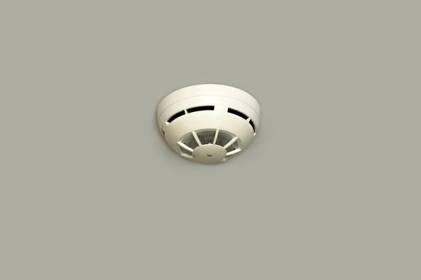 White Smoke alarm on the room ceiling