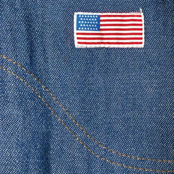 Jeans azuis, etiqueta de bandeira americana — Fotografia de Stock