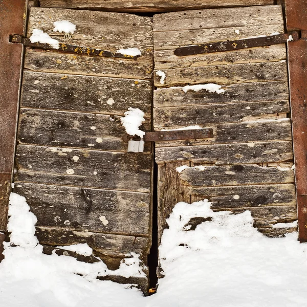 Wooden door of old mill — Stock Photo, Image