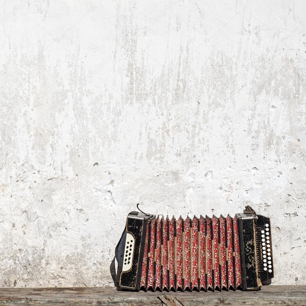 Wall and accordion on the bench