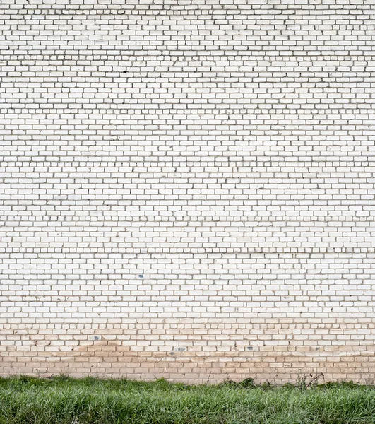 Enorme witte bakstenen muur — Stockfoto
