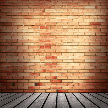kırmızı tuğla duvar ve ahşap zemin