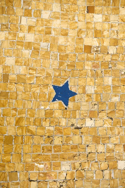 Sivri uçlu bir mavi beş yıldızlı gösterilen antik döşeme mozaiği — Stok fotoğraf