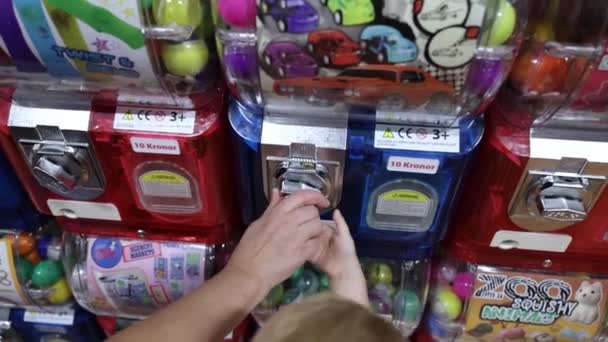 Close View Adult Women Helping Child Get Toy Automat Machine — Stock Video