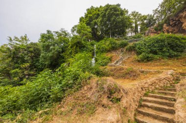 Beautiful nature landscape view of stair path up to waterfalls Greece. 