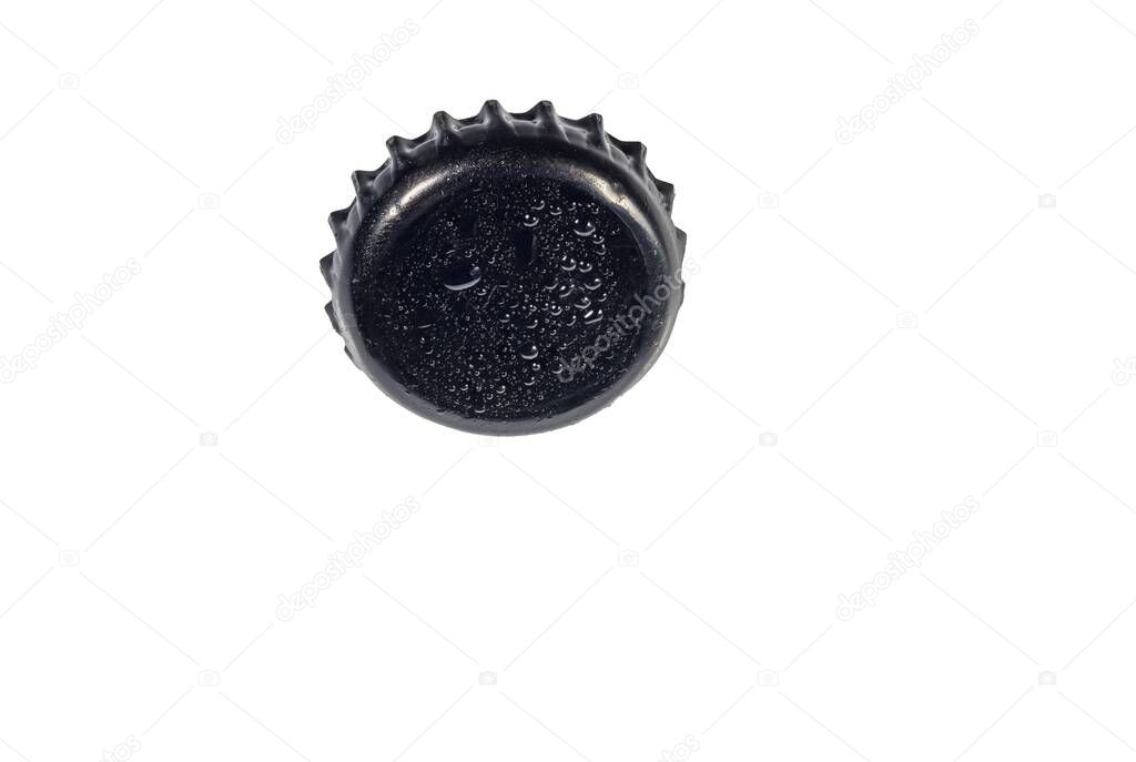 Close up view of black metal cap with drops isolated on white background.