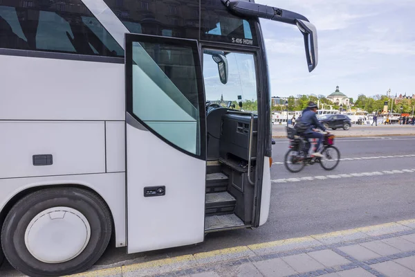 Close up view of open door to white tourist excursion bus. Tourism concept. Sweden.