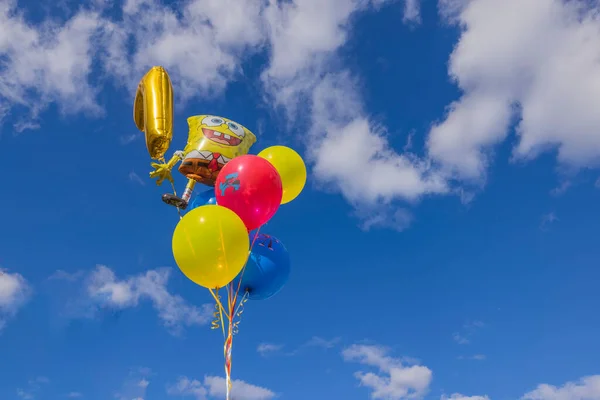 View Festive Balloons Child Developing Wind Blue Sky White Clouds —  Fotos de Stock