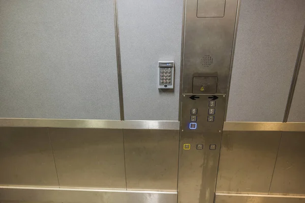 Close up interior view of modern elevator digital control panel.
