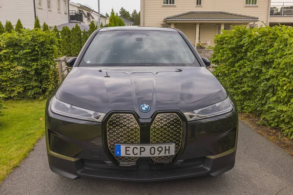 Beautiful front view of BMW IX40 black car electric model. Sweden. Uppsala. 08.18.2022.