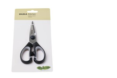 Close up view of kitchen scissors from Swedish company DUKA isolated on white background. Sweden. Uppsala. 08.21.2022.