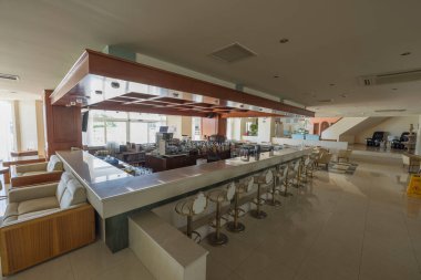 Beautiful interior view of bar counter of modern hotel. Drinks and alcohol concept. Rhodes. Greece. 08.15.2022