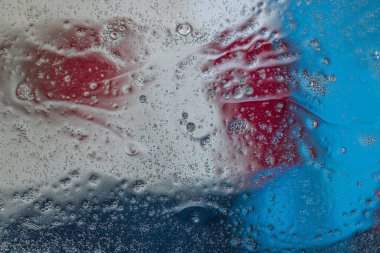 Kırmızı, mavi, beyaz soyut tasarım su dokusunun güzel manzarası.