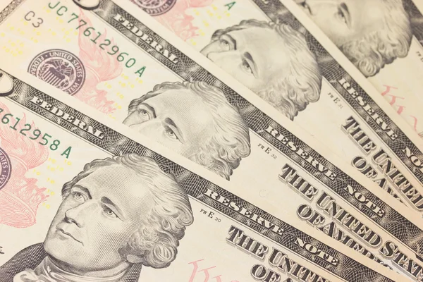 Antecedentes com dinheiro notas de 10 dólares dos EUA — Fotografia de Stock