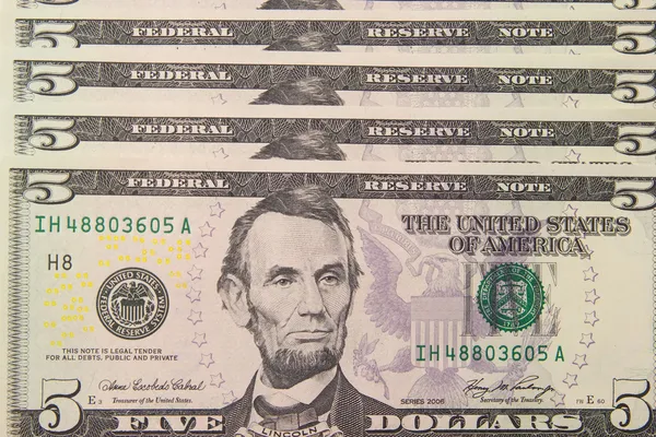 Background with money US 5 dollar bills — Stock Photo, Image