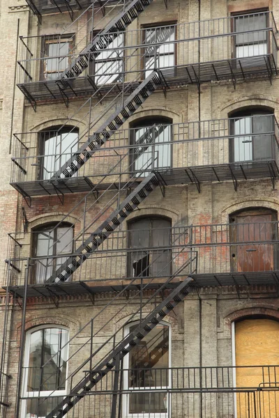 Old building with outdoor staircase — Stock Photo, Image