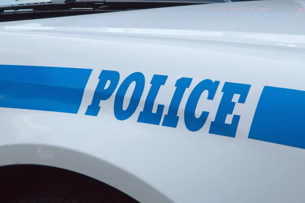 A closeup of the police car with a sign POLICE. — Stock Photo, Image