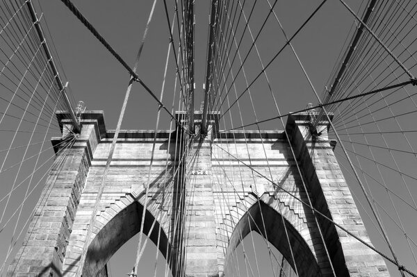 Monochromatic view of Brooklyn Bridge pillar (New York City, USA)