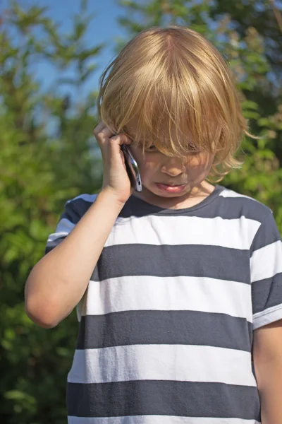 Crying blond boy is calling. — Stock Photo, Image