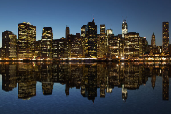 Lower Manhattan at night. Reflection.New York City, USA)