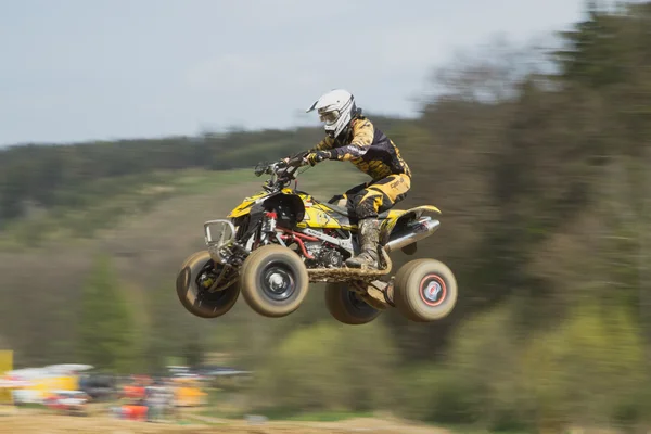 High jump quad — Stock Photo, Image