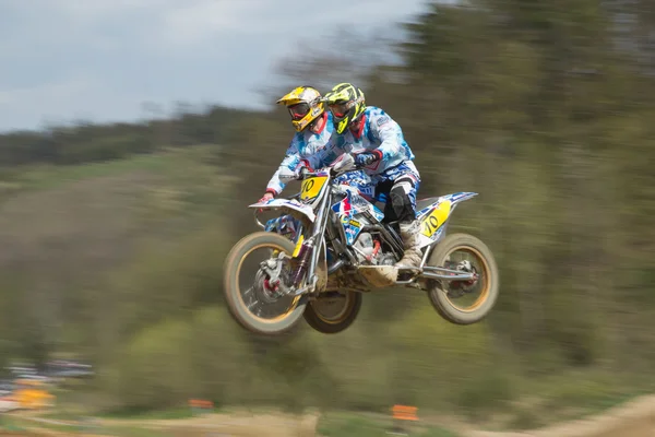 Dynamic shot of sidecars jumping — Stock Photo, Image