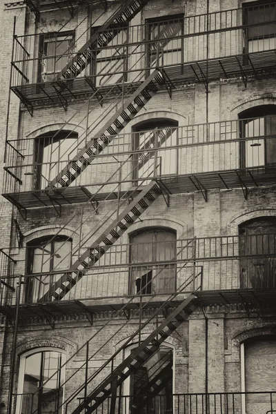 Old building with outdoor staircase — Stock Photo, Image