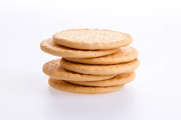 Stoh kulaté sušenky na šedém pozadí — Stock fotografie