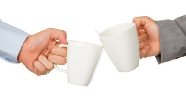 Business partners hands holding cups of coffee clipart