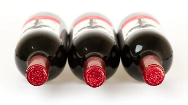 Three bottles of wine isolated — Stock Photo, Image