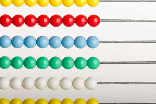Close-up of an abacus on a white background — Stock Photo, Image