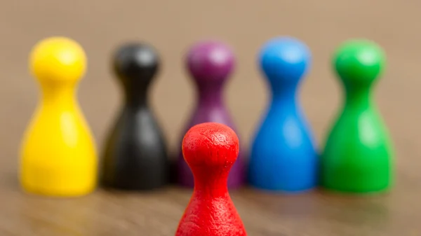 Six colored pawns isolated — Stock Photo, Image