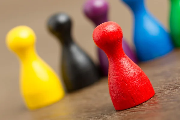 Six colored pawns isolated — Stock Photo, Image