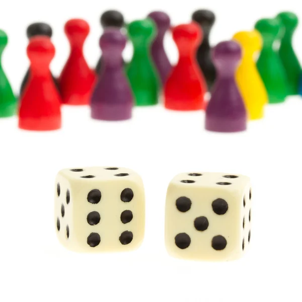 Dice and pawns — Stock Photo, Image