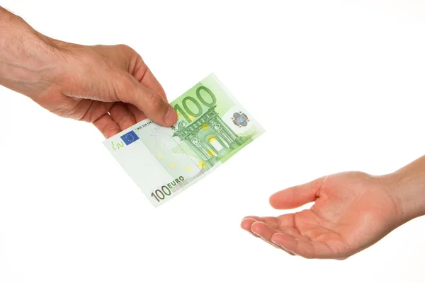 Мужчина дает 100 евро женщине — стоковое фото