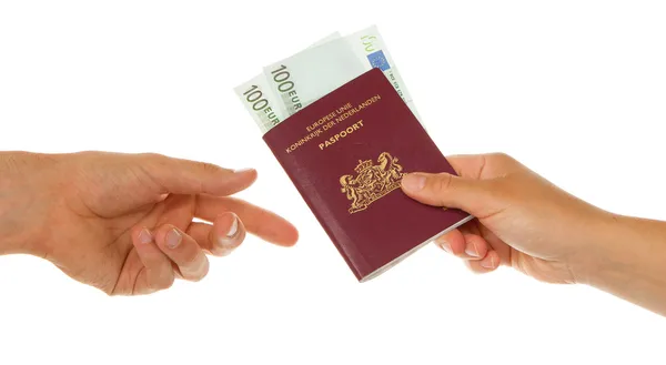 Woman giving passport with money — Stock Photo, Image