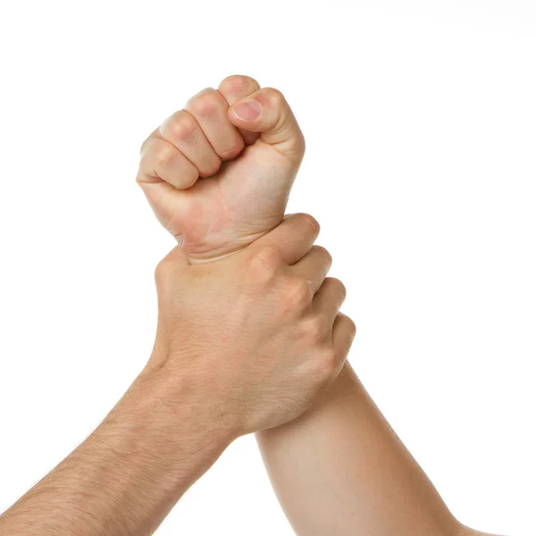 Hombre sosteniendo mujer por muñeca — Foto de Stock