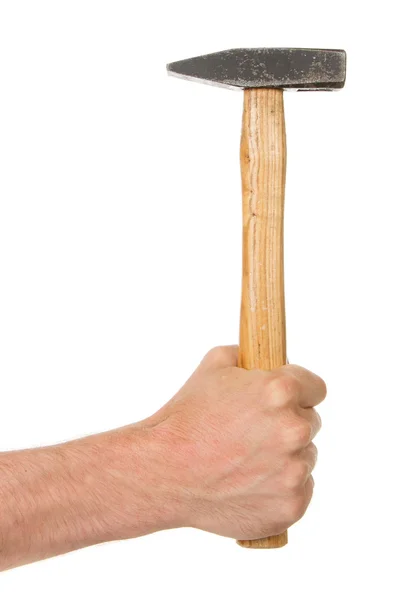 Homem segurando um velho martelo de madeira — Fotografia de Stock