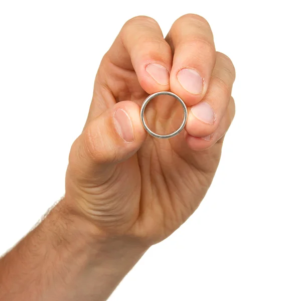 Man holding a silver ring — Stock Photo, Image