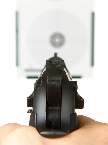 Пистолет нацелен на мишень — стоковое фото