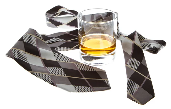 Glass of whisky and a tie — Stock Photo, Image