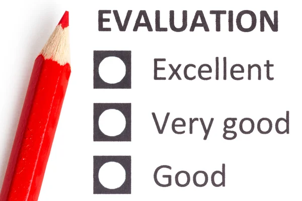 Lápis vermelho num formulário de avaliação — Fotografia de Stock