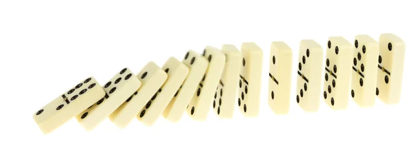Long train of dominoes falling over — Stock Photo, Image