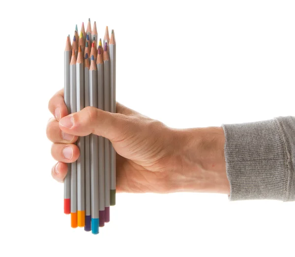 Man holding several color pencils — Stock Photo, Image