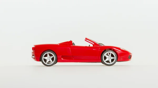 Un coche de juguete, deportivo rojo —  Fotos de Stock