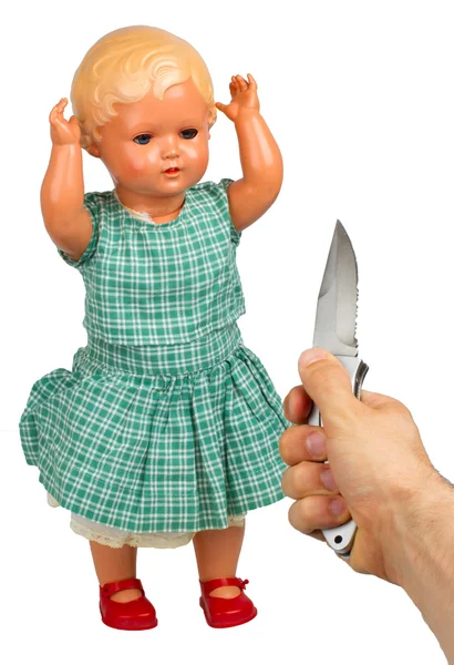 Very old baby doll (1940s) with knife — Stock Photo, Image