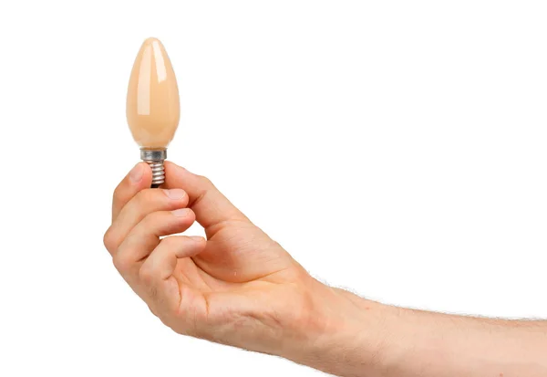 Man holding an orange lightbulb — Stock Photo, Image